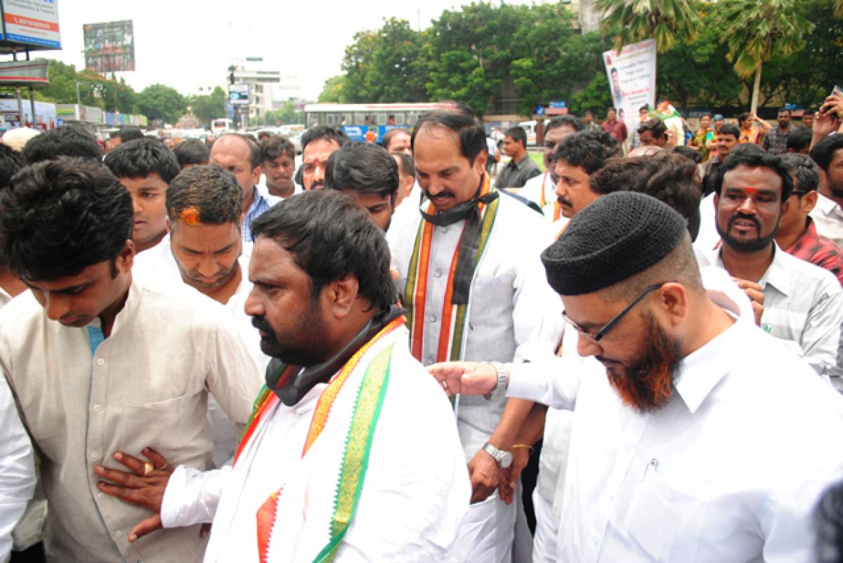 TPCC and APCC leaders protesting against the suspension of 25 MPs from Lok Sabha at Nampally in Hyderabad on Tuesday.